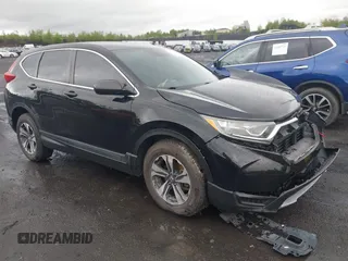 2018 Honda CR-V LX z VIN 2HKRW6H31JH201269, wystawiony jako IAAI lot #42196417 z przebiegiem 96 498 mil mil oraz . Historia ofert i sprzedaży dostępna na DreamBid. Obrazek 1.