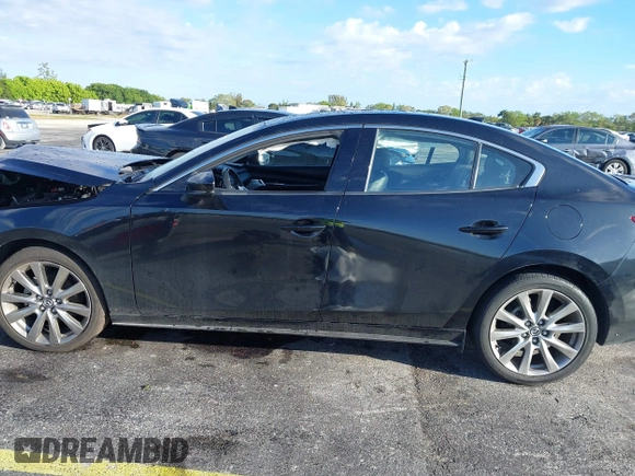 2021 Mazda 3 Premium with VIN JM1BPADL7M1303484, listed as a IAAI auction lot 41666785 with 34,476 mi miles and . Bid and sale history available at DreamBid. Image 14.