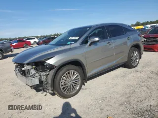 2022 Lexus RX with VIN 2T2JZMAA8NC256470, listed as a Copart auction lot 82873304 with 14,614 mi miles and Salvage Title. Bid and sale history available at carsss.com. Image 1.