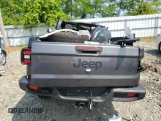 2023 Jeep Gladiator Sport S z VIN 1C6HJTAGXPL573758, wystawiony jako Copart lot #56635955 z przebiegiem Nie podano mil oraz Szkoda całkowita • Salvage title. Historia ofert i sprzedaży dostępna na DreamBid. Obrazek 6.