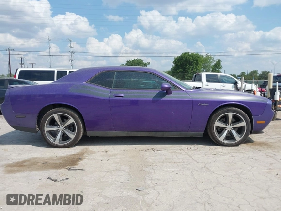 2014 Dodge Challenger R/T z VIN 2C3CDYBT0EH143576, wystawiony jako IAAI lot #42333984 z przebiegiem 189 874 mil mil oraz . Historia ofert i sprzedaży dostępna na DreamBid. Obrazek 13.