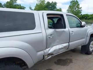 2013 Toyota Tacoma with VIN 3TMMU4FN1DM055477, listed as a IAAI auction lot 42306479 with 191,792 mi miles and . Bid and sale history available at DreamBid. Image 6.