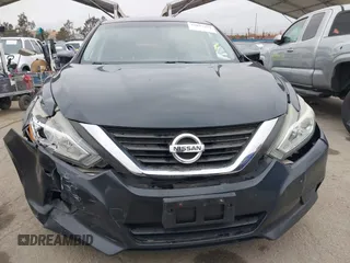 2016 Nissan Altima S with VIN 1N4AL3AP4GN344572, listed as a IAAI auction lot 42047459 with 129,336 mi miles and . Bid and sale history available at carsss.com. Image 12.