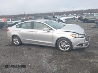 2018 Ford Fusion SE z VIN 3FA6P0HD2JR207865, wystawiony jako IAAI lot #41835895 z przebiegiem 91 069 mil mil oraz . Historia ofert i sprzedaży dostępna na DreamBid. Obrazek 13.