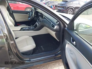 2023 Genesis G70 2.0T with VIN KMTG34TA4PU126965, listed as a IAAI auction lot 41971103 with 27,304 mi miles. Bid and sale history available at carsss.com. Image 5.
