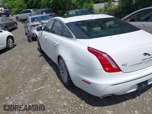 2015 Jaguar XJ with VIN SAJWA1CZ0F8V75119, listed as a IAAI auction lot 42248663 with 94,060 mi miles and . Bid and sale history available at DreamBid. Image 3.
