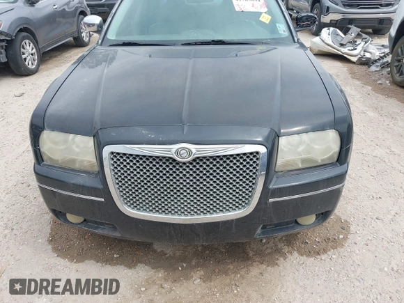2010 Chrysler 300 Touring with VIN 2C3CA5CV0AH329717, listed as a IAAI auction lot 41785694 with 257,072 mi miles. Bid and sale history available at carsss.com. Image 12.