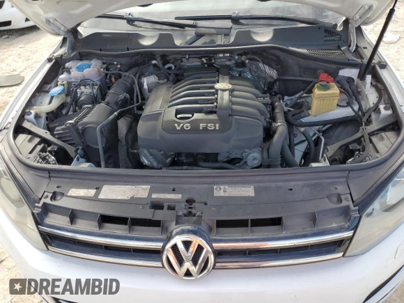 2012 Volkswagen Touareg Exec with VIN WVGEF9BP1CD008717, listed as a Copart auction lot 86095164 with 211,089 mi miles and Clean Title. Bid and sale history available at DreamBid. Image 12.
