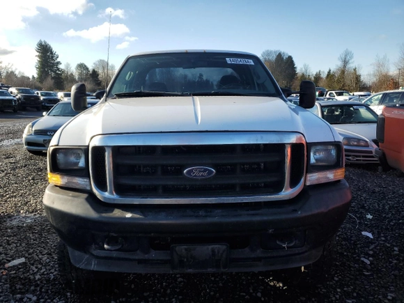 2003 Ford F-350 XL with VIN 1FTSX31P63EB62658, listed as a Copart auction lot 84054284 with 227,705 mi miles and Salvage Title. Bid and sale history available at DreamBid. Image 5.