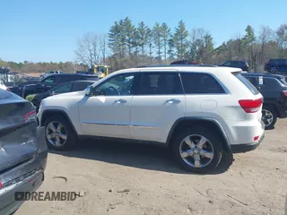 2011 Jeep Grand Cherokee Overland Summit with VIN 1J4RR6GT9BC546825, listed as a IAAI auction lot 42118789 with 123,449 mi miles. Bid and sale history available at carsss.com. Image 14.