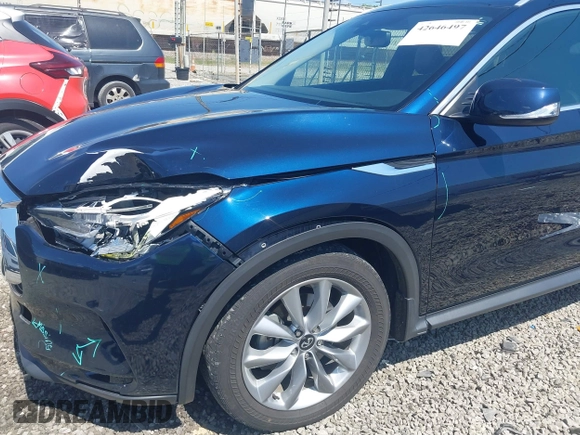 2022 Infiniti QX50 Luxe z VIN 3PCAJ5BA9NF108288, wystawiony jako IAAI lot #42646497 z przebiegiem 65 145 mil mil oraz . Historia ofert i sprzedaży dostępna na DreamBid. Obrazek 18.
