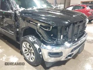 2022 Ram 1500 Limited with VIN 1C6SRFHT9NN481884, listed as a IAAI auction lot 41679409 with 47,571 mi miles and . Bid and sale history available at DreamBid. Image 6.