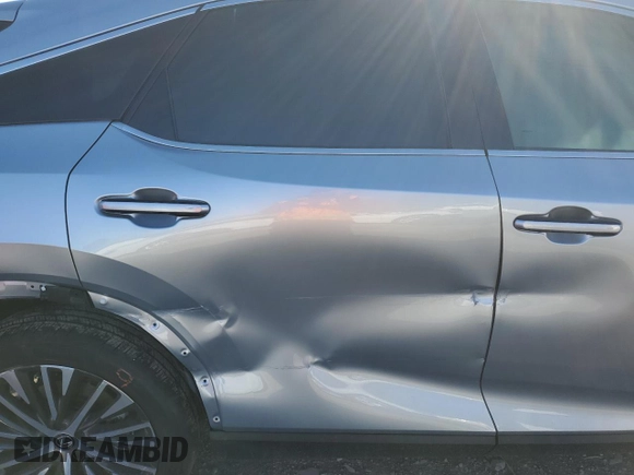 2025 Lexus RX 350h with VIN 2T2BBMCA2SC070683, listed as a Copart auction lot 49420725 with 2,218 mi miles and Salvage title. Bid and sale history available at DreamBid. Image 12.