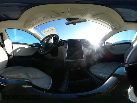 2014 Tesla Model S 60 z VIN 5YJSA1H15EFP48938, wystawiony jako IAAI lot #41574976 z przebiegiem 230 246 mil mil oraz . Historia ofert i sprzedaży dostępna na DreamBid. Obrazek 20.