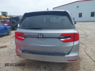 2021 Honda Odyssey Touring with VIN 5FNRL6H8XMB034837, listed as a IAAI auction lot 41856444 with 84,950 mi miles. Bid and sale history available at carsss.com. Image 16.