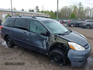 2009 Toyota Sienna CE with VIN 5TDZK23C59S288000, listed as a IAAI auction lot 41953399 with 199,863 mi miles. Bid and sale history available at carsss.com. Image 1.