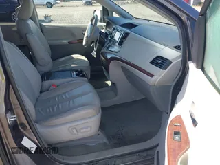 2014 Toyota Sienna XLE with VIN 5TDYK3DC5ES451965, listed as a IAAI auction lot 41879334 with 145,114 mi miles and . Bid and sale history available at DreamBid. Image 5.
