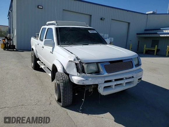 2000 Nissan Frontier XE z VIN 1N6ED27T3YC422129, wystawiony jako Copart lot #46668975 z przebiegiem 333 836 mil mil oraz Szkoda całkowita • Salvage title. Historia ofert i sprzedaży dostępna na DreamBid. Obrazek 11.