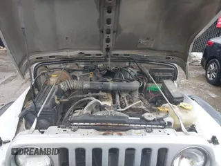 2006 Jeep Wrangler Sport Right Hand Drive with VIN 1J4F449SX6P764491, listed as a IAAI auction lot 41709726 with 290,798 mi miles. Bid and sale history available at carsss.com. Image 10.