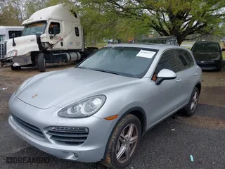 2012 Porsche Cayenne S Hybrid with VIN WP1AE2A2XCLA90082, listed as a IAAI auction lot 41960714 with 139,081 mi miles. Bid and sale history available at carsss.com. Image 2.