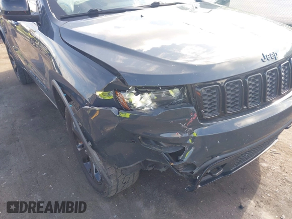 2018 Jeep Grand Cherokee Altitude with VIN 1C4RJFAG7JC394051, listed as a IAAI auction lot 42492771 with 147,669 mi miles and . Bid and sale history available at DreamBid. Image 6.