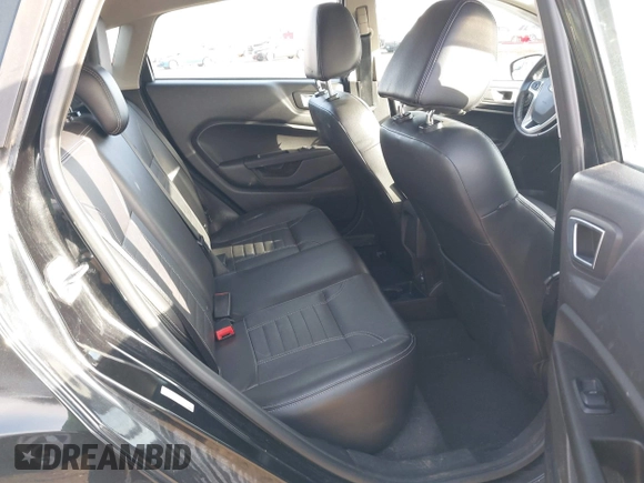 2014 Ford Fiesta Titanium z VIN 3FADP4FJXEM127644, wystawiony jako IAAI lot #41555040 z przebiegiem 107 046 mil mil oraz . Historia ofert i sprzedaży dostępna na DreamBid. Obrazek 8.