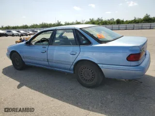 1995 Ford Taurus GL with VIN 1FALP52U6SG266810, listed as a Copart auction lot 53521525 with 63,135 mi miles and Clean Title. Bid and sale history available at carsss.com. Image 2.