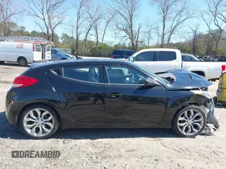 2013 Hyundai Veloster w/Gray Int with VIN KMHTC6AD9DU137473, listed as a IAAI auction lot 41846203 with 67,781 mi miles. Bid and sale history available at carsss.com. Image 13.
