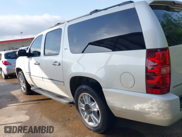 2010 Chevrolet Suburban LTZ with VIN 1GNUKKE38AR251895, listed as a IAAI auction lot 42020123 with 166,130 mi miles. Bid and sale history available at carsss.com. Image 14.