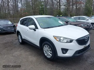 2013 Mazda CX-5 Sport with VIN JM3KE2BEXD0121551, listed as a IAAI auction lot 41728326 with 137,319 mi miles. Bid and sale history available at carsss.com. Image 1.