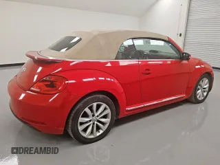 2013 Volkswagen Beetle 2.0L TDI w/Sound/Nav с VIN 3VW6L7AT0DM827922, выставлен на аукционе Copart как лот 59270675 с пробегом 139 246 миль миль и Чистый • Clean title. История ставок и продаж доступна на DreamBid. Изображение 3.