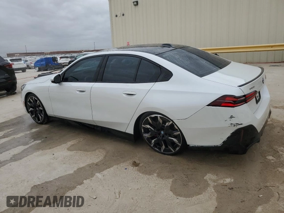 2024 BMW 5 Series 530i with VIN WBA43FJ09RCS08705, listed as a Copart auction lot 42008855 with 7,993 mi miles and Salvage Title. Bid and sale history available at carsss.com. Image 2.