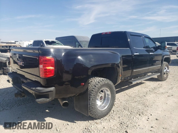 2018 GMC Sierra 3500HD Denali z VIN 1GT42YEY6JF115211, wystawiony jako Copart lot #78333694 z przebiegiem 178 170 mil mil oraz Czysty tytuł • Clean title. Historia ofert i sprzedaży dostępna na DreamBid. Obrazek 3.