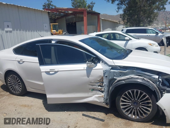 2017 Ford Fusion Titanium z VIN 3FA6P0SU0HR329224, wystawiony jako IAAI lot #42291605 z przebiegiem 176 728 mil mil oraz . Historia ofert i sprzedaży dostępna na DreamBid. Obrazek 14.