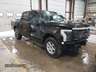 2023 Ford F-150 Lightning Pro with VIN 1FTVW1EV5PWG59228, listed as a IAAI auction lot 40838790 with Not Provided miles and . Bid and sale history available at DreamBid. Image 1.