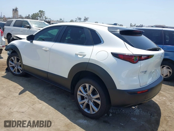 2021 Mazda CX-30 Select with VIN 3MVDMBBL9MM313039, listed as a IAAI auction lot 42575424 with 21,083 mi miles and . Bid and sale history available at DreamBid. Image 3.
