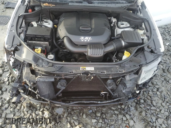 2014 Jeep Grand Cherokee Limited z VIN 1C4RJFBG8EC129868, wystawiony jako Copart lot #86781534 z przebiegiem 99 316 mil mil oraz Szkoda całkowita • Salvage title. Historia ofert i sprzedaży dostępna na DreamBid. Obrazek 13.