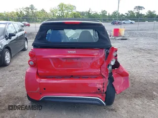 2013 Smart fortwo Passion z VIN WMEEK3BA5DK591221, wystawiony jako IAAI lot #42010853 z przebiegiem 101 953 mil mil oraz . Historia ofert i sprzedaży dostępna na DreamBid. Obrazek 16.
