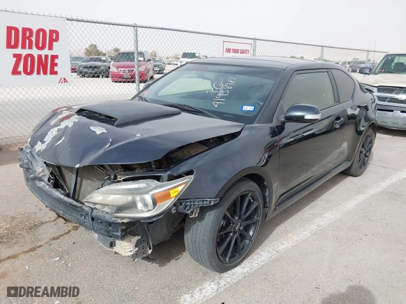 2016 Scion tC with VIN JTKJF5C76GJ017584, listed as a IAAI auction lot 41938981 with 121,166 mi miles. Bid and sale history available at carsss.com. Image 17.