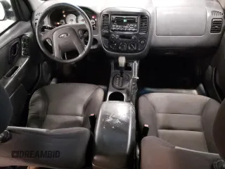 2007 Ford Escape XLS with VIN 1FMCU92Z77KA84801, listed as a Copart auction lot 82052144 with 180,774 mi miles and Salvage title. Bid and sale history available at DreamBid. Image 8.