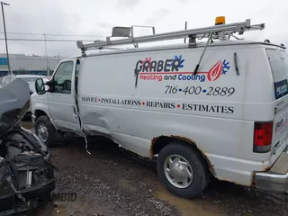 2011 Ford Econoline Cargo Commercial with VIN 1FTNE1EW1BDA17492, listed as a IAAI auction lot 41036647 with 242,810 mi miles and . Bid and sale history available at DreamBid. Image 14.