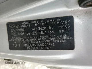 2003 Hyundai Accent GL with VIN KMHCG35CX3U270374, listed as a Copart auction lot 47240325 with 122,739 mi miles and Salvage Title. Bid and sale history available at carsss.com. Image 12.