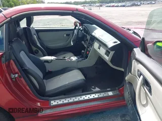 2000 Mercedes-Benz SLK 230 Kompressor with VIN WDBKK47F2YF146797, listed as a IAAI auction lot 42823113 with 35,881 mi miles and . Bid and sale history available at DreamBid. Image 5.