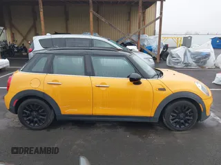 2018 MINI Hardtop 4 Door Cooper with VIN WMWXU1C59J2F79169, listed as a IAAI auction lot 40973679 with 97,507 mi miles and . Bid and sale history available at DreamBid. Image 13.