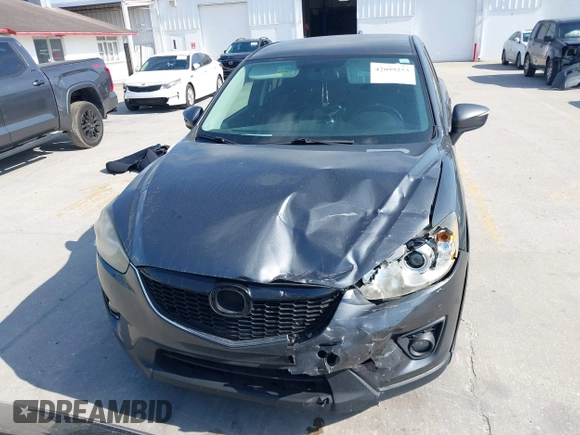2015 Mazda CX-5 Touring with VIN JM3KE2CY9F0468199, listed as a IAAI auction lot 42099253 with 110,909 mi miles and . Bid and sale history available at carsss.com. Image 12.