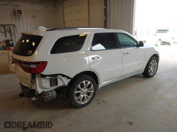 2016 Dodge Durango Citadel with VIN 1C4RDJEG9GC371805, listed as a IAAI auction lot 42135988 with 122,924 mi miles and . Bid and sale history available at DreamBid. Image 4.