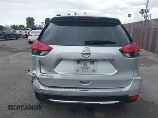 2018 Nissan Rogue S with VIN KNMAT2MT2JP605822, listed as a IAAI auction lot 42061477 with 114,808 mi miles. Bid and sale history available at carsss.com. Image 16.