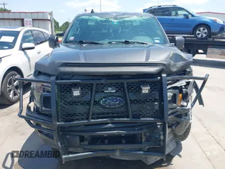 2019 Ford F-150 XL with VIN 1FTEW1E44KKE47489, listed as a IAAI auction lot 42211083 with 139,615 mi miles and . Bid and sale history available at DreamBid. Image 13.