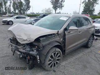 2019 Lincoln MKC Reserve with VIN 5LMCJ3C9XKUL09386, listed as a IAAI auction lot 41857681 with 66,101 mi miles and . Bid and sale history available at DreamBid. Image 2.