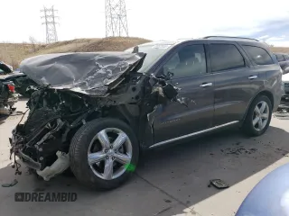 2013 Dodge Durango Citadel z VIN 1C4SDJETXDC688227, wystawiony jako Copart lot #49037955 z przebiegiem Nie podano mil oraz Szkoda całkowita • Salvage title. Historia ofert i sprzedaży dostępna na DreamBid. Obrazek 1.